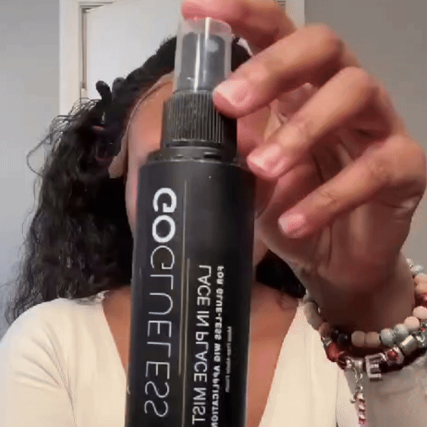 Woman styling lace wig with GoGlueless Mist – residue-free hold for sensitive skin
